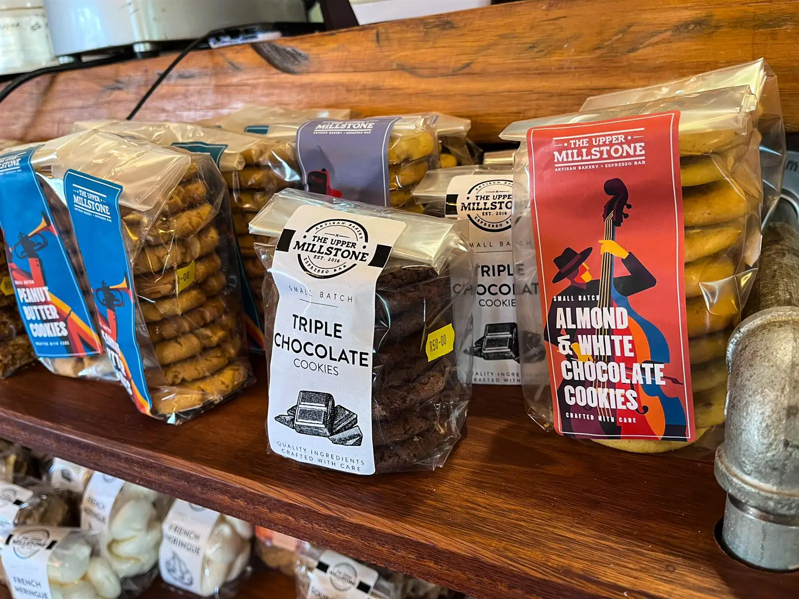 Packaged peanut butter, triple chocolate and almond white chocolate cookies
