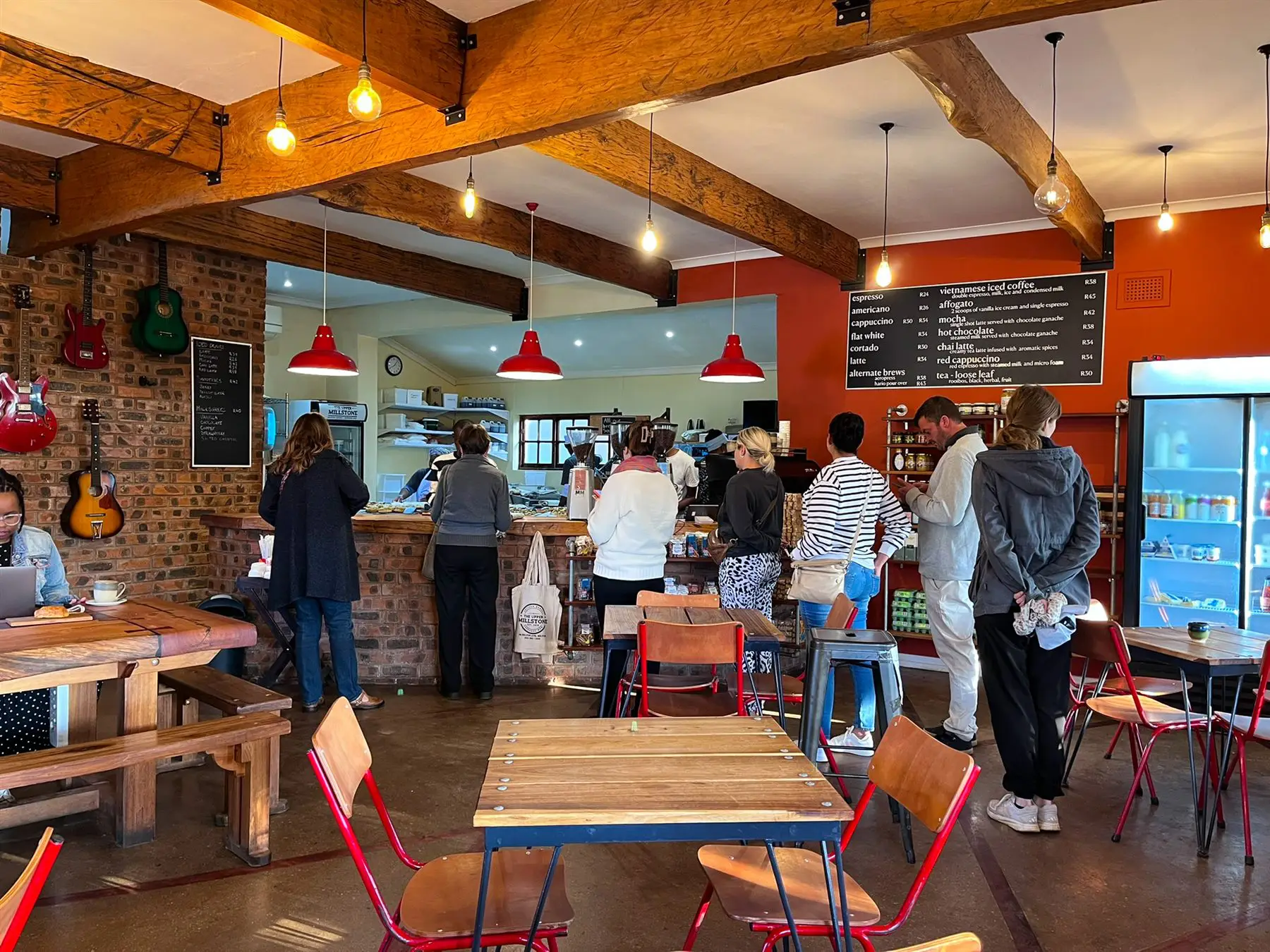 Locals gathered at The Upper Millstone — full tables, real community